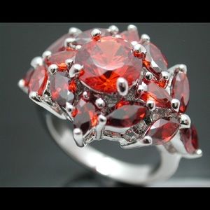 Stunning Crystal Garnet Color Ring